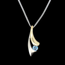 Load image into Gallery viewer, 9ct Yellow and White Gold Aquamarine Pendant with curb link chain, on a black background