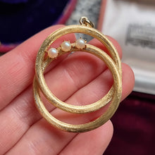 Load image into Gallery viewer, Vintage 14k Gold Pearl Double Circle Pendant in hand