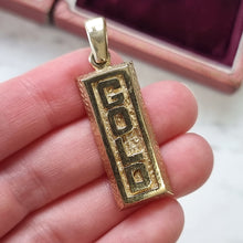 Load image into Gallery viewer, Vintage 9ct Yellow Gold Solid Ingot Pendant, 13.5 grams, held in the hand