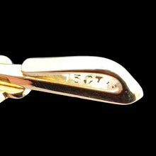 Load image into Gallery viewer, Close-up of a 15CT stamp on a yellow gold pendant