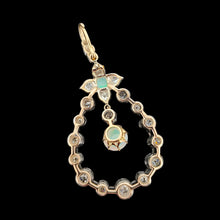 Load image into Gallery viewer, A pear shaped open pendant set with opals and diamonds, in gold and silver