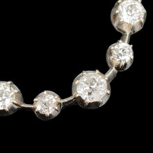 Load image into Gallery viewer, Close-up of a diamond pendant in silver