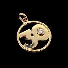 Load image into Gallery viewer, A yellow gold 30 pendant with a brilliant cut diamond