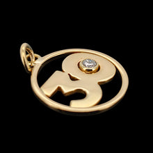 Load image into Gallery viewer, A yellow gold 30 pendant with a brilliant cut diamond