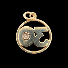 Load image into Gallery viewer, A yellow gold 30 pendant with a brilliant cut diamond