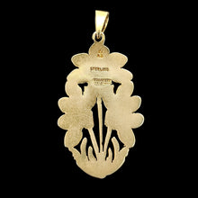 Load image into Gallery viewer, A flower shaped pendant, on a black background