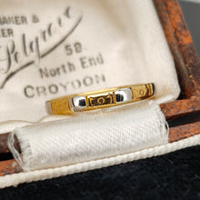 Load image into Gallery viewer, An eight sided band ring in gold and platinum with floral engraving, in an antique ring box