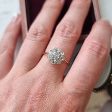 Load image into Gallery viewer, Close-up of a hand wearing a diamond ring with a blurred background