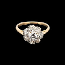 Load image into Gallery viewer, Gold ring with diamond flower design on a black background
