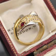 Load image into Gallery viewer, A yellow and white gold dolphin ring with diamonds and ruby eyes, in an antique ring box