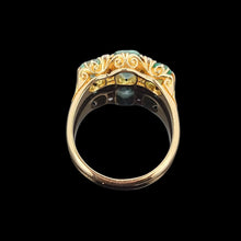 Load image into Gallery viewer, Gold ring with emeralds and diamonds on a black background