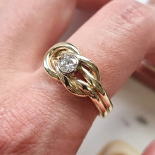 Load image into Gallery viewer, Gold ring with a diamond on a finger