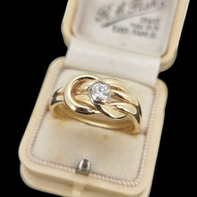 Load image into Gallery viewer, Gold ring with a diamond in an open antique ring box