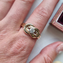 Load image into Gallery viewer, Gold ring with a diamond on a person's finger