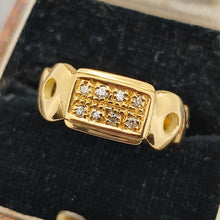 Load image into Gallery viewer, A yellow gold band with two rows of round diamonds, in a ring box