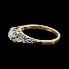 Load image into Gallery viewer, An old cut diamond solitaire ring in gold and platinum, on a black background
