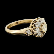Load image into Gallery viewer, A yellow gold old cut diamond cluster ring, on a black background