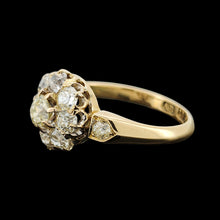 Load image into Gallery viewer, A yellow gold old cut diamond cluster ring, on a black background
