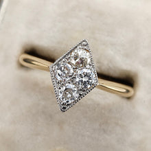 Load image into Gallery viewer, A rhombus shaped four stone diamond ring in yellow gold and platinum, in an antique ring box