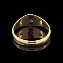 Load image into Gallery viewer, A three stone ruby and diamond ring in yellow gold