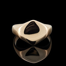Load image into Gallery viewer, A gold hexagonal shaped signet ring, on a black background