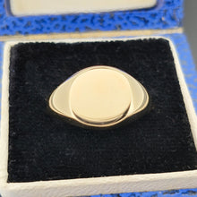 Load image into Gallery viewer, A yellow gold round signet ring, in a ring box