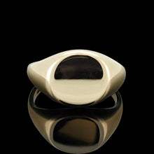 Load image into Gallery viewer, A yellow gold round signet ring, on a black background