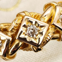 Load image into Gallery viewer, Close-up of a yellow gold three stone diamond ring