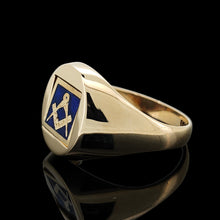 Load image into Gallery viewer, A yellow gold signet ring with an enamelled Masonic square
