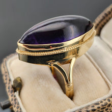 Load image into Gallery viewer, A yellow gold navette shaped cabochon cut amethyst solitaire ring, in a ring box