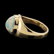 Load image into Gallery viewer, A yellow gold oval turquoise solitaire ring, on a black background
