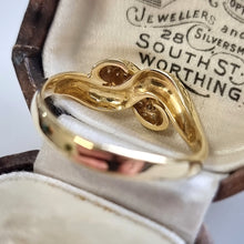 Load image into Gallery viewer, 18ct Yellow Gold Brilliant Cut Diamond Twist Ring behind head