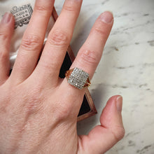 Load image into Gallery viewer, A square shaped diamond cluster ring yellow and white gold, modelled on a hand