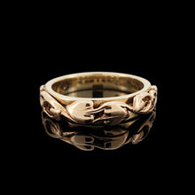 Load image into Gallery viewer, A yellow gold leaf motif band ring, on a black background