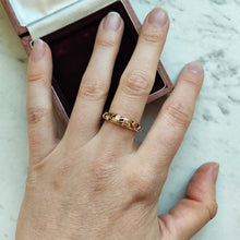 Load image into Gallery viewer, A yellow gold leaf motif band ring, modelled on a hand
