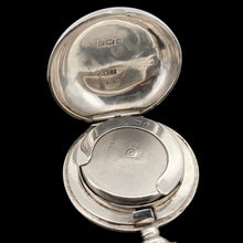 Load image into Gallery viewer, A silver sovereign case, on a black background