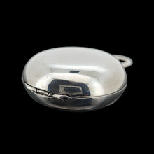 Load image into Gallery viewer, A silver sovereign case, on a black background