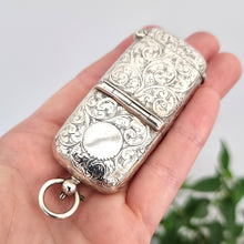 Load image into Gallery viewer, Antique Sterling Silver Sovereign Holder & Vesta Case in hand