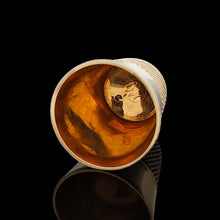 Load image into Gallery viewer, A yellow gold thimble, on a black background