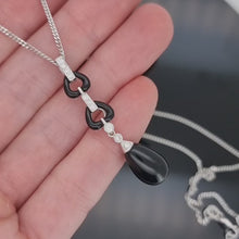 Load and play video in Gallery viewer, 18ct & 9ct White Gold Onyx and Diamond Drop Necklace