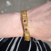 Load image into Gallery viewer, Edwardian 9ct Gold Ruby, Diamond & Seed Pearl Bangle modelled