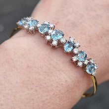 Load image into Gallery viewer, Vintage 18ct Gold Aquamarine & Diamond Articulated Bangle modelled