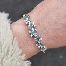 Load image into Gallery viewer, Vintage 18ct Gold Aquamarine & Diamond Articulated Bangle modelled