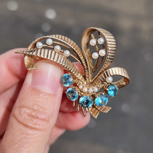 Load image into Gallery viewer, Vintage 9ct Gold Blue Zircon & Pearl Bouquet Brooch in hand