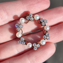 Load image into Gallery viewer, Antique 9ct Gold & Silver Diamond and Pearl Circle Brooch in hand