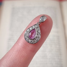 Load image into Gallery viewer, Vintage 18ct White Gold Pink Sapphire & Diamond Pendant in hand