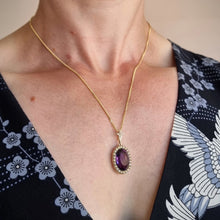 Load image into Gallery viewer, Antique 9ct Gold Amethyst & Seed Pearl Cluster Pendant modelled around the neck with a yellow gold chain