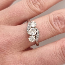 Load image into Gallery viewer, Vintage Platinum Diamond Three Stone Crossover Ring, 0.70ct modelled