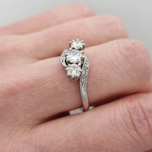 Load image into Gallery viewer, Vintage Platinum Diamond Three Stone Crossover Ring, 0.70ct modelled