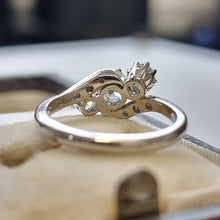 Load image into Gallery viewer, Vintage Platinum Diamond Three Stone Crossover Ring, 0.70ct from behind